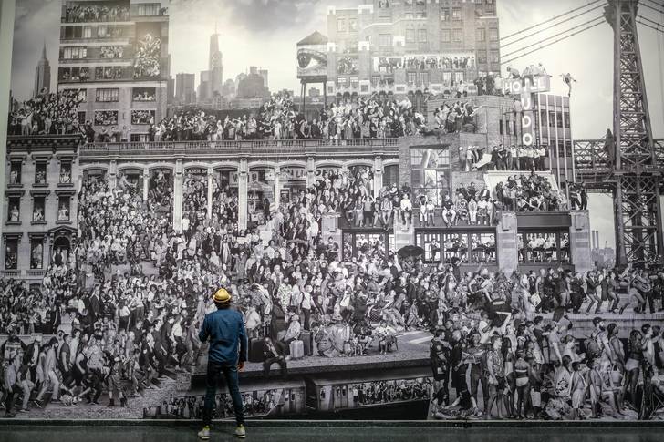 A large mural showing people in NYC